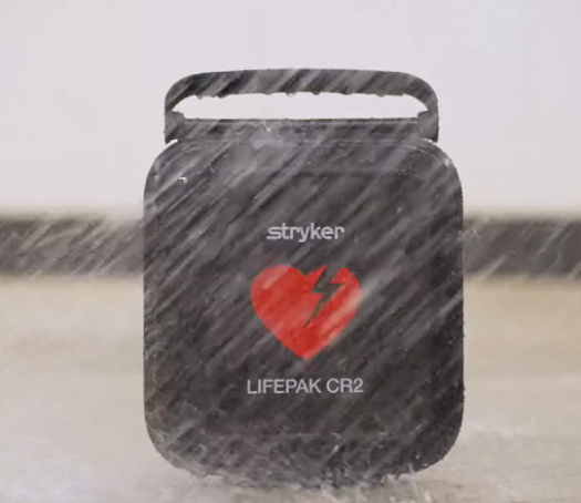 Black LIFEPAK CR2 TOUGHCase in heavy rain