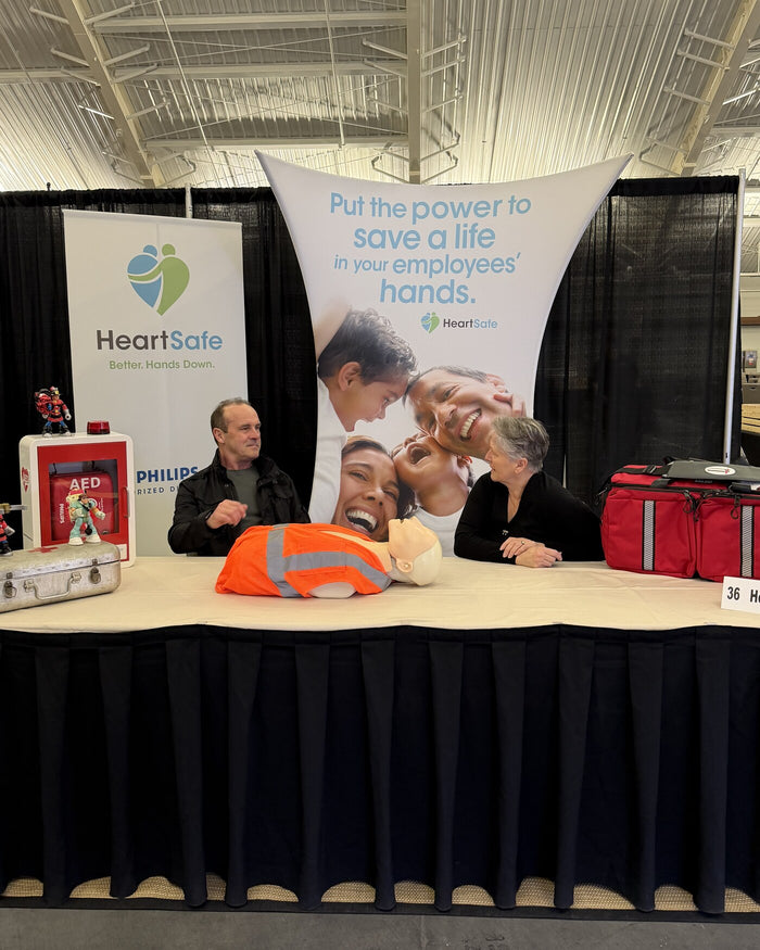 HeartSafe EMS booth with AED equipment and responder training gear