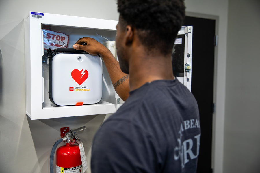 Stryker LIFEPAK CR2 AED visible in a public access cabinet