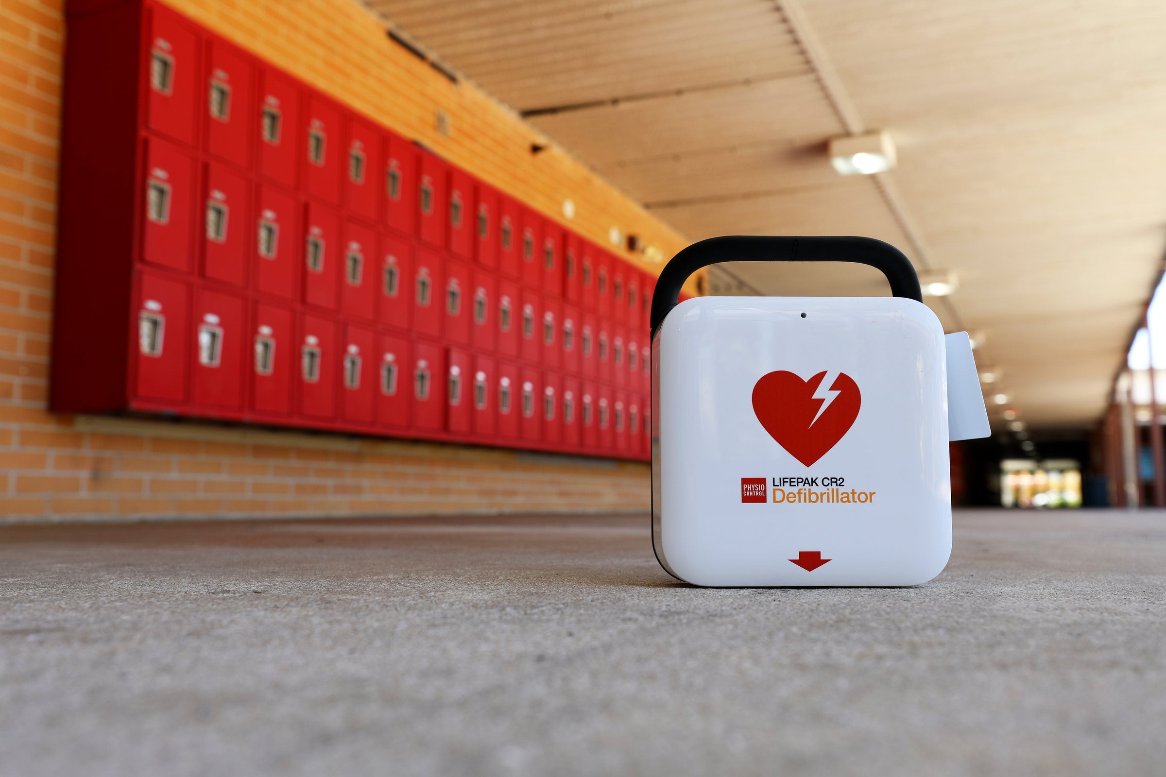 Stryker LIFEPAK CR2 AED installed in a school hallway